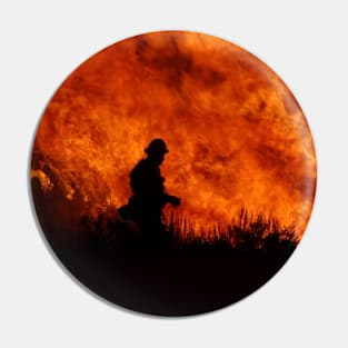 Fireman Silhouette in front of Fire Pin