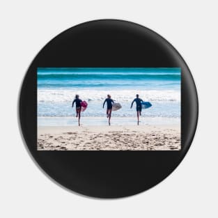 Three surfers. Pin