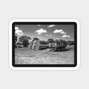 Hay bale stack and tractor trailer in the Norfolk countryside Magnet