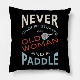 Never Underestimate and Old Woman and a Paddle Pillow