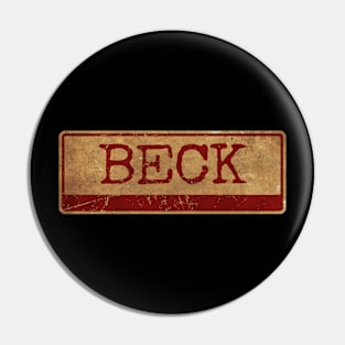 Aliska text red gold retro Beck Pin