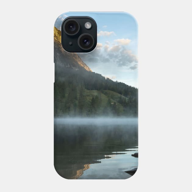 Misty Lake Portrait wide angle with boathouse. Amazing shot of a wooden house in the Ferchensee lake in Bavaria, Germany, in front of a mountain belonging to the Alps. Scenic foggy morning scenery at sunrise. Phone Case by EviRadauscher
