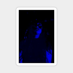 Beautiful girl. Very dark, blue light. Magnet