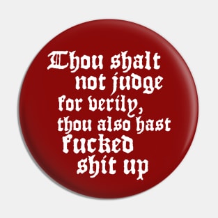 "Thou shalt not judge..." in white - tongue-in-cheek blackletter gothic saying with a punch Pin