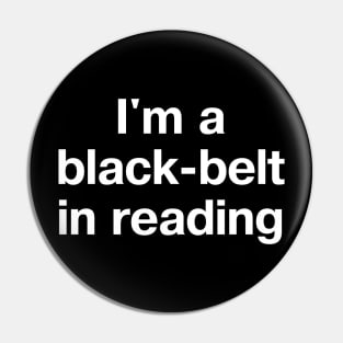 "I'm a black-belt in reading" in plain white letters - bibliophiles of the world, unite (in the library) Pin