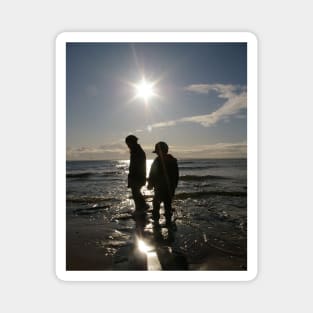 Children Silhouetted On A Beach Magnet