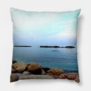 Calm Adriatic sea surrounded by massive rocks under the light blue sky Pillow