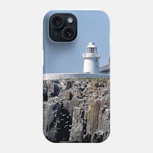 Guillemots on the cliffs below Inner Farne lighthouse Phone Case