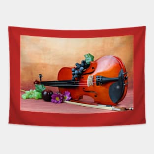 A still life of a Violin Tapestry