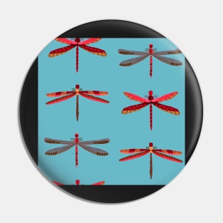 Stacked Thailand red dragonflies on light blue Pin