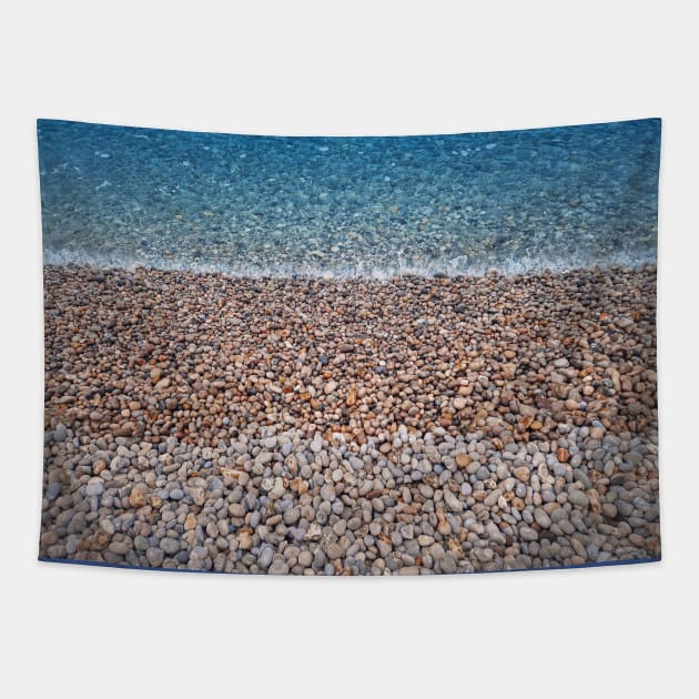 Pebble rocks beach Tapestry by psychoshadow