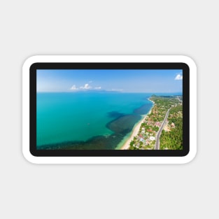 Aerial panoramic view of ocean, beach and blue cloudy sky Magnet