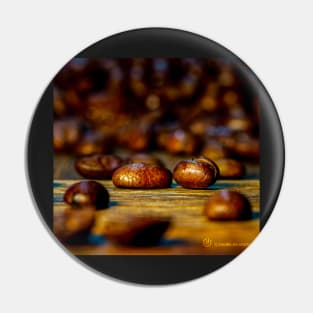 Coffee beans on a wooden table Pin