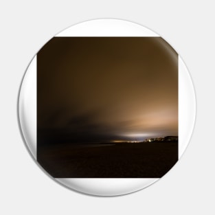 Beach of Carnon with an Illuminated Cloud Cover at Night Pin