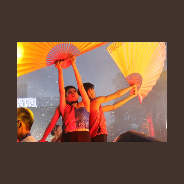 Dance performer raising arms with paper fans by kall3bu