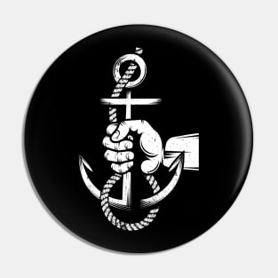 Sailor hand holds an anchor with rope Pin