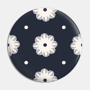 Beige flowers and dots over dark blue Pin