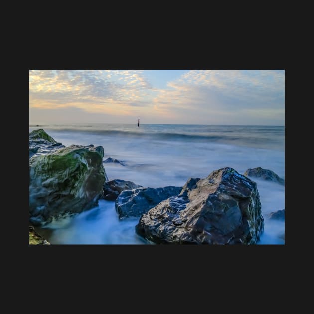 Rocks protecting the fragile cliffs from coastal erosion by yackers1