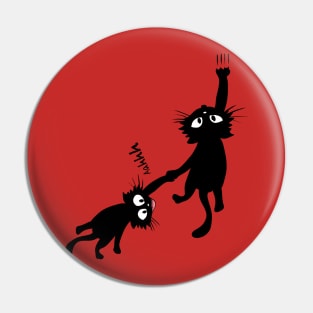 Black cat holding on Pin