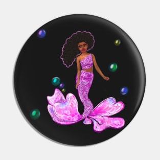 Coco the Magical rainbow mermaid with brown eyes, flowing Afro hair and caramel brown skin Pin