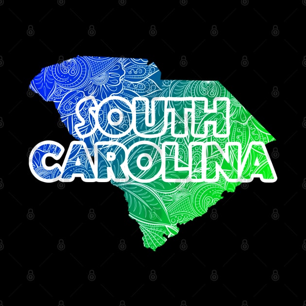 Colorful mandala art map of South Carolina with text in blue and green by Happy Citizen