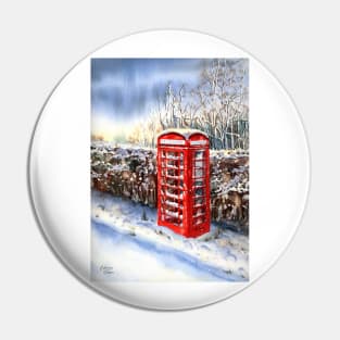 Red telephone box in the snow Pin