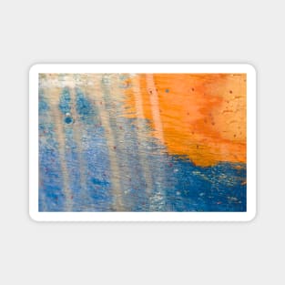 Beautiful blue and orange combination painted wooden surface with scratches Magnet