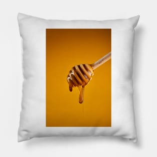 Honey dripping on wooden dipper Pillow