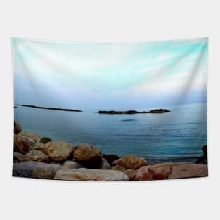 Calm Adriatic sea surrounded by massive rocks under the light blue sky Tapestry