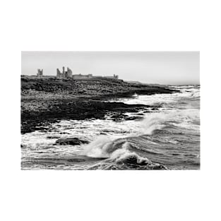 Rough waves hit the rocks near Dunstanburgh castle in Northumberland, UK T-Shirt