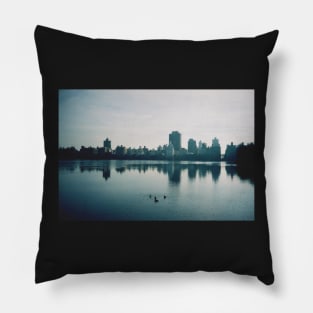 Film photo of Central Park, New York City, with its lake and surrounded buildings Pillow