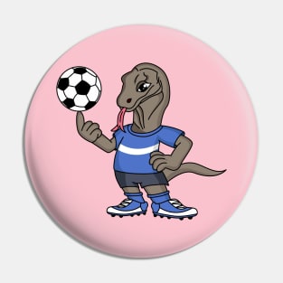 Cute funny Komodo dragon playing soccer cartoon Pin