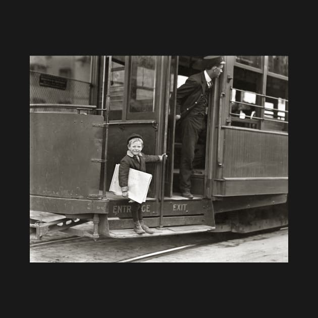 Newsboy Riding Trolley, 1910. Vintage Photo by historyphoto