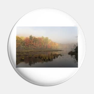 Fall colours over a lake in the early morning Pin