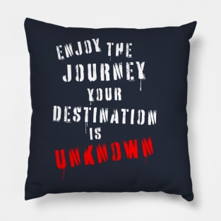 Enjoy the journey your destination is unknown quotation in stencil lettering. Pillow