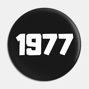 Essentials 1977 Pin