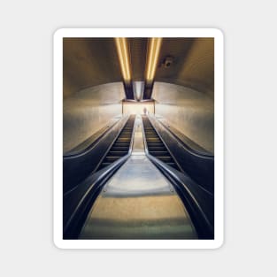 climbing a subway escalator Magnet