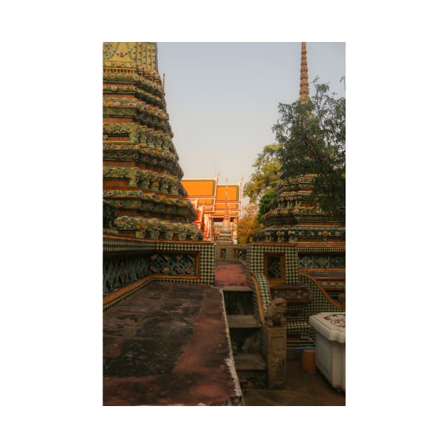 Second sidewalk view to ornate roof, flanked from parts of Chedis at Wat Pho. by kall3bu