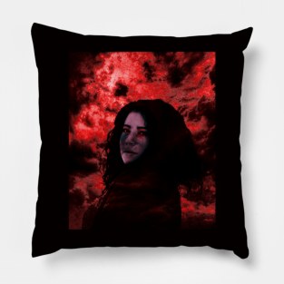 Beautiful girl with dark hair on dark red clouds background. Violet face, red eyes. Pillow