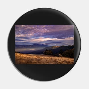 Sunset clouds over mountains Pin