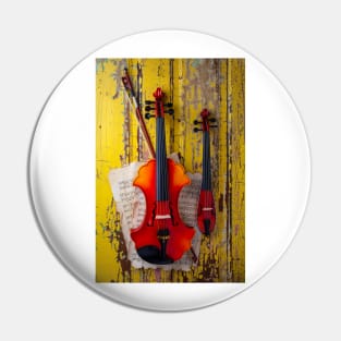 Baroque And Pocket Violin Hanging On Wall Pin