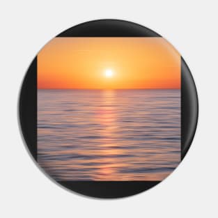 Calm Water With Sun and Orange Sky Pin