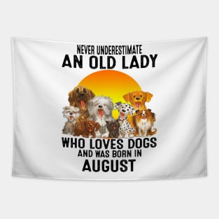 Never Underestimate An Old August Lady Who Loves Dogs Tapestry