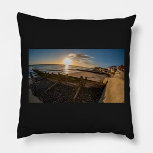 Fisheye view of wooden groynes on Cromer beach at sunrise Pillow