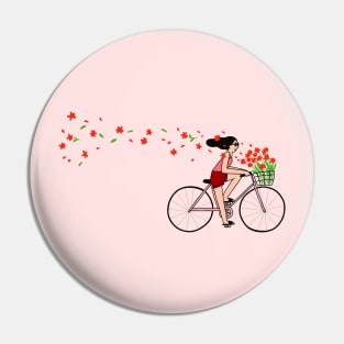 Girl Cycling with Flowers Pin