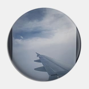 Plane flight through the dense clouds Pin