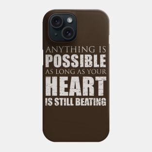 Anything is possible as long as your heart is still beating Phone Case