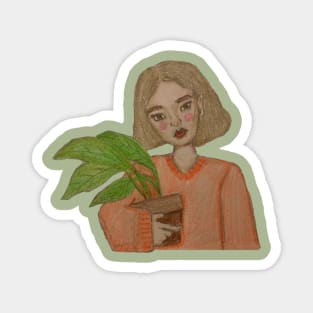 girl holding a plant Magnet