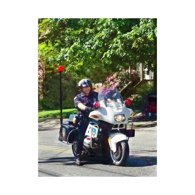 Policeman On Motorcycle by SusanSavad