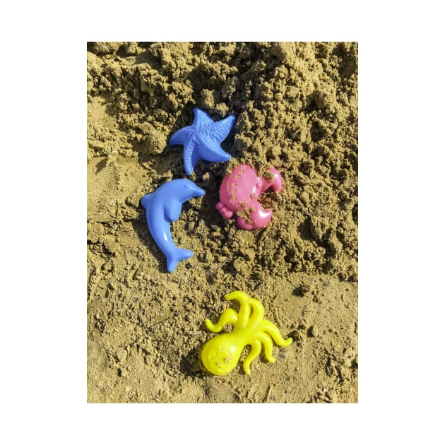 Colored shapes with sand on the beach by lena-maximova